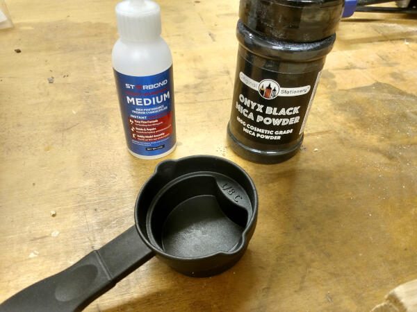 Use a container like this to apply the mica powder in your inlay with a router project